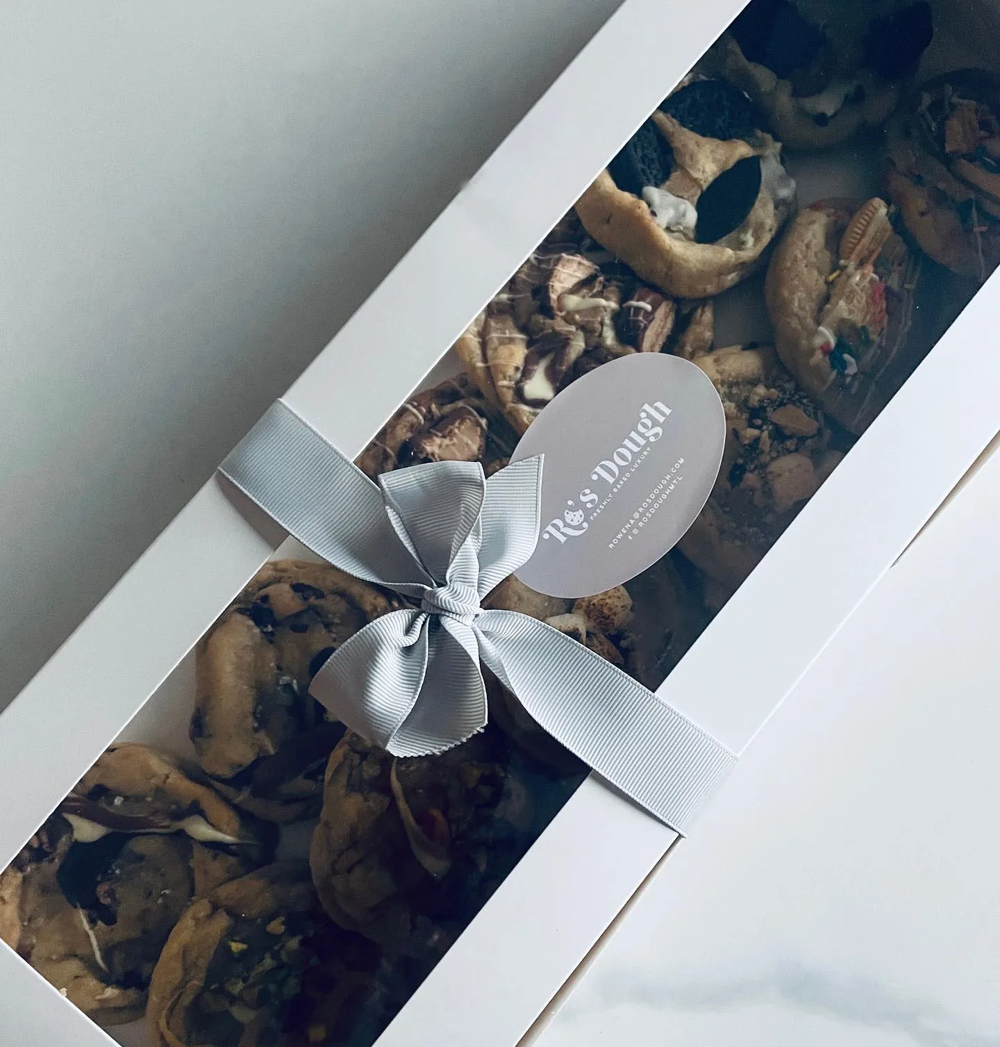 16 cookie box closed grey ribbon overhead