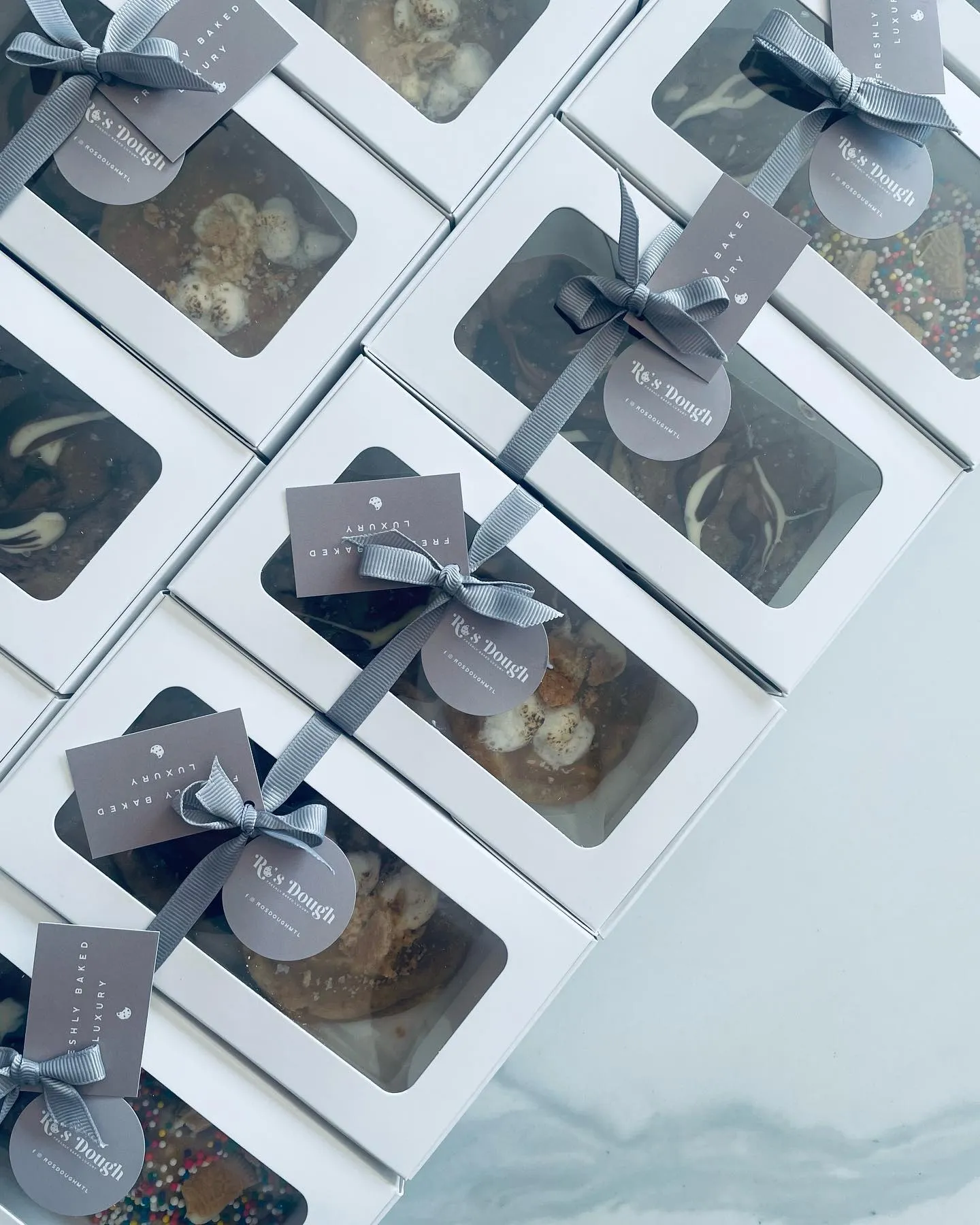 6 cookie boxes grey ribbon luxury cards overhead